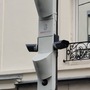 The noise radar has been installed high on a street lamp post in the 20th district in eastern Paris. (@David_Belliard/Twitter)