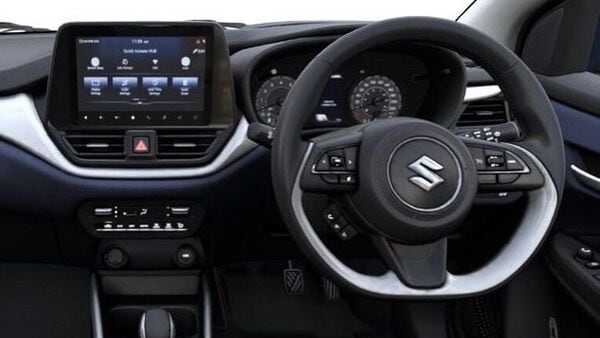 The dual-tone dashboard is now dominated by Maruti's new 9-inch digital touchscreen infotainment system.