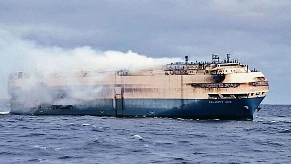 A fire broke out in the Felicity Ace’s cargo, forcing the evacuation of the crew. The vessel was carrying around 4,000 luxury cars from Porsche, Audi and Bentley. (MINT_PRINT)