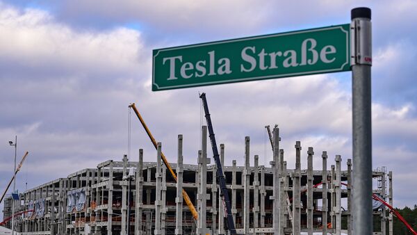 The street sign "Tesla Strasse" stands at the construction site of the Tesla Gigafactory Berlin Brandenburg. (AP)