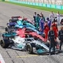 Drivers pose for a picture during the first day of Formula One (F1) pre-season testing at the Bahrain International Circuit. (AFP)
