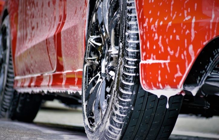 Soap up: Regular cleaning of a car with soap and water can remove road dust, grime and other larger contaminants.