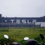 File photo: A Tesla sign is seen at its factory in Shanghai, China, (REUTERS)
