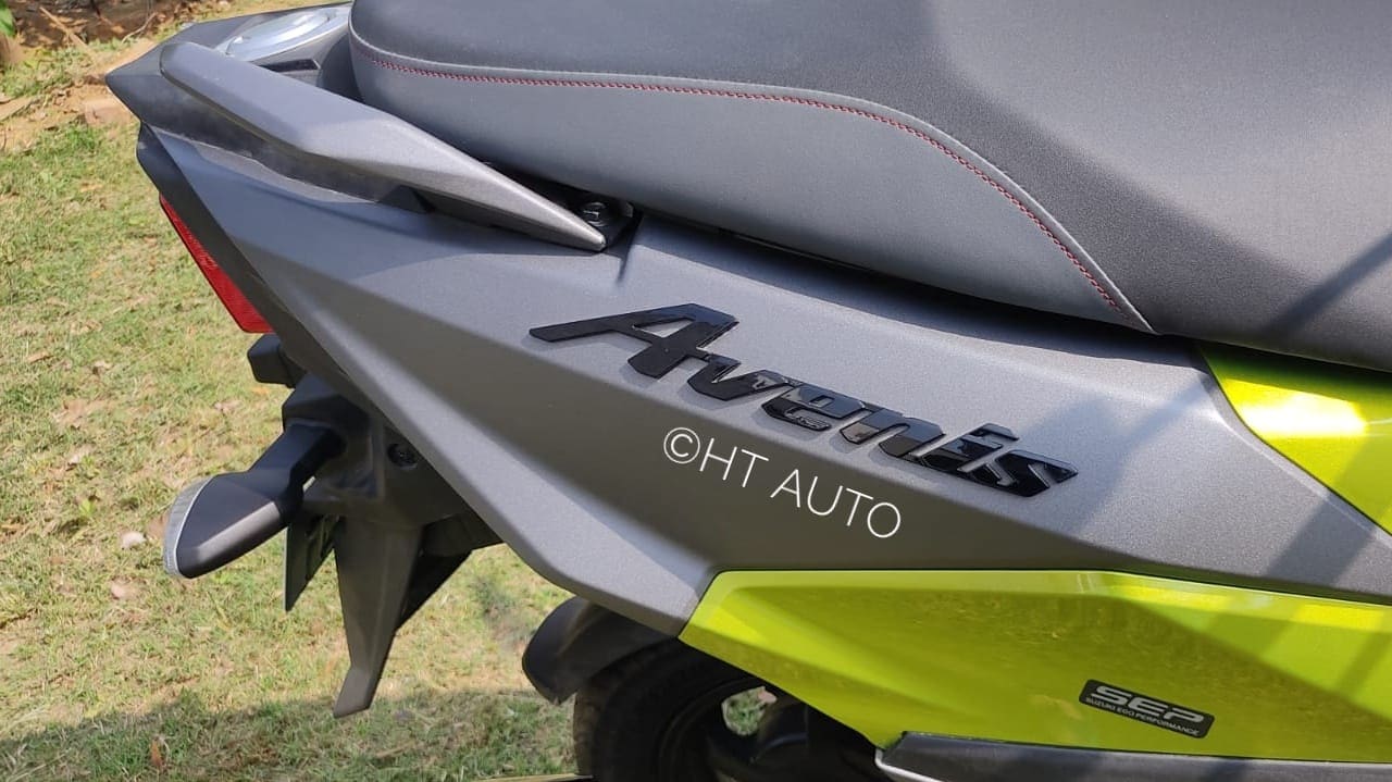 While the standard colour options on the Suzuki Avenis 125 features model branding in dark, the Race Edition gets the same in bright Orange/Red.