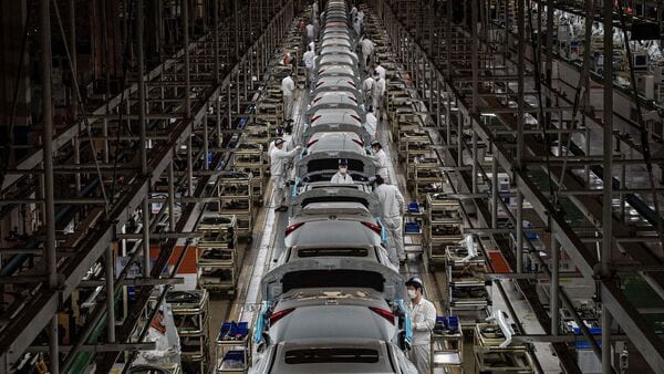 Automakers are looking at a production slump in both 2022 and 2023. (AFP)