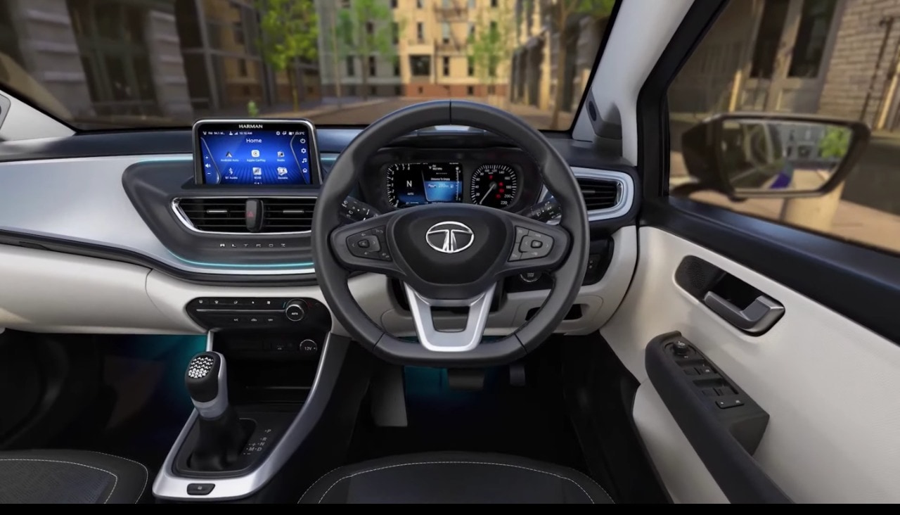 The cabin of the new Altroz now also gets fabric finishing on door armrests besides a 7-inch touchscreen infotainment system, the usual connected car features like Apple CarPlay, Android Auto and Tata's own IRA-connected car features. The cabin of the new Altroz now also gets fabric finishing on door armrests besides a 7-inch touchscreen infotainment system, the usual connected car features like Apple CarPlay, Android Auto and Tata's own IRA-connected car features.