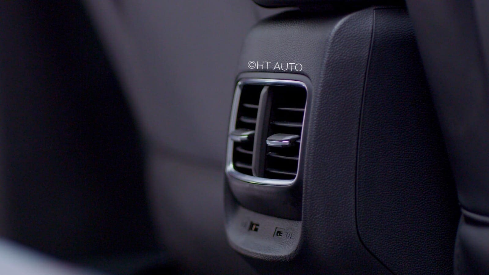There are plenty of USB charging points all around the ZS EV. This shows the points just under the rear AC vents.