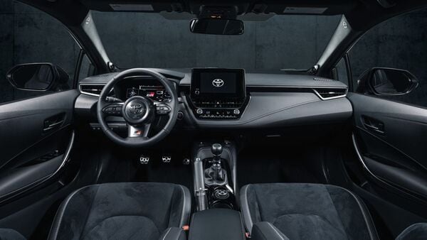 The interior of the Toyota GR Corolla i s inspired by racing cars and gets red stitching to add to its sportiness.