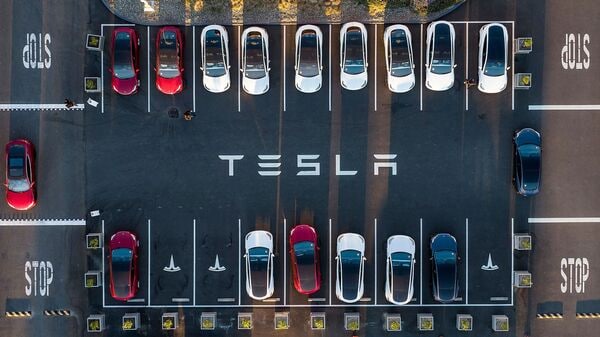 This file photo taken on February 10 shows an aerial view of cars parked at the Tesla Fremont Factory in Fremont, California. (AFP)
