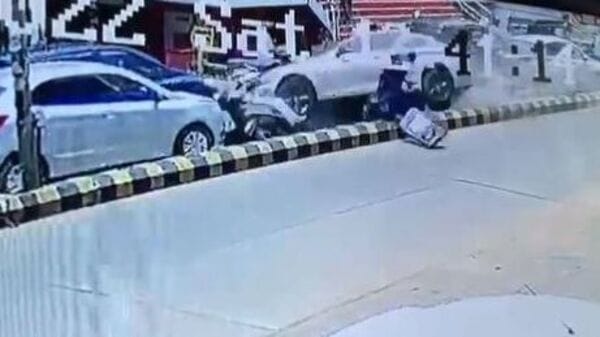 Watch: Speeding BMW car jumps divider, hits woman riding scooty in ...