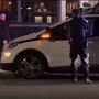 Police officer peeping into driverless Chevrolet Bolt EV (b.rad916/Instagram)