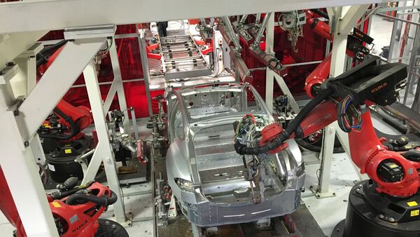 File photo: Tesla vehicles are being assembled by robots at Tesla Motors Inc factory in Fremont, California. (REUTERS)