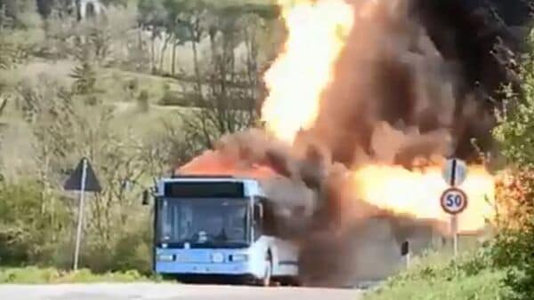 The city bus was not carrying any passengers at the time of the incident and the driver managed to escape to safety. (Screenshot from video posted on Twitter by @KiwiEV