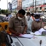 Police personnel fine a motorist. (Representational File Photo)