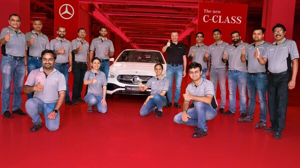 In pic: Martin Schwenk MD & CEO, Mercedes-Benz India and key production members at the roll out of the 2022 Mercedes-Benz C-Class