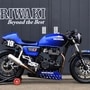 The custom Honda H'Ness CB 350 sports a traditional Moriwaki blue and yellow paint scheme.
