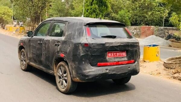 The rear bumper on the upcoming D22 SUV can be seen sporting quite a muscular design, along with provisions for the rear parking sensors. The rear bumper on the upcoming D22 SUV can be seen sporting quite a muscular design, along with provisions for the rear parking sensors.