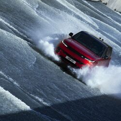 New Range Rover Sport resists the surging torrent of water flowing down the ramp of the Karahnjukar Dam.&nbsp;