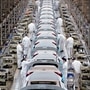 FILE PHOTO: Employees work on a production line inside a car factory in Wuhan, the capital of Hubei province and China's epicenter of the novel coronavirus disease (COVID-19) outbreak. (REUTERS)