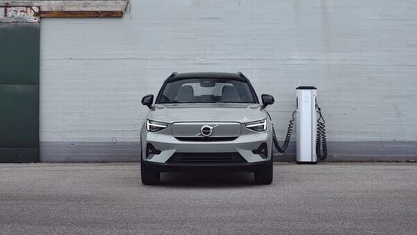 A Volvo electric vehicle being charged at an EV charging point.