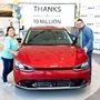 Customers of a new Kia EV6 celebrate their new purchase which was also a key milestone for the company in the US.