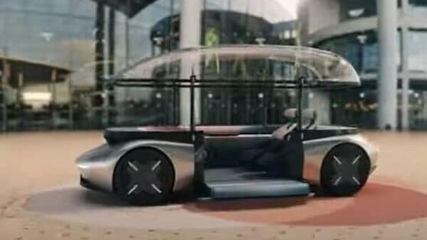 This futuristic, autonomous pod vehicle is a living room on wheels