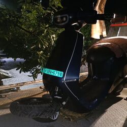 Photo of an Ola electric scooter with a broken front fork.