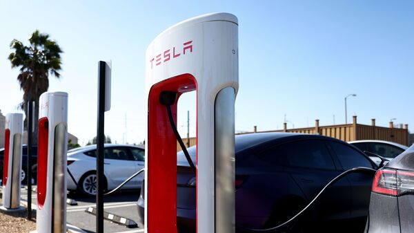 Tesla cars at a Tesla Supercharger station. (AFP)