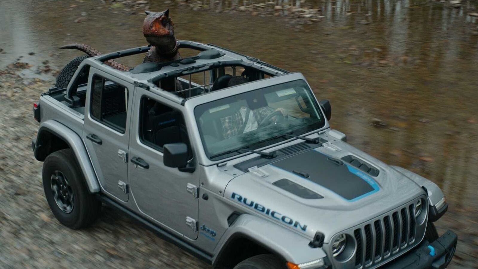 Watch: Jeep Wrangler 4Xe gives rides to a pet dinosaur | HT Auto