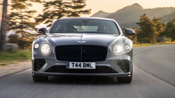 The exterior of the all-new Bentley Continental GT and GTC S models sport a black gloss radiator grille along with an S badging on the front fenders. 