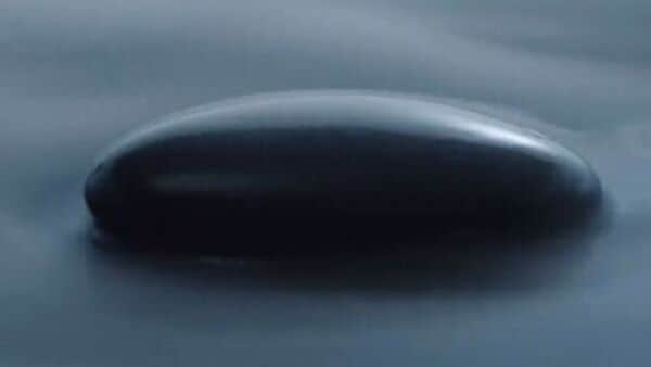 Screengrab from teaser of Hyundai Ioniq 6. The vehicle's silhouette will take inspiration from streamlined objects.