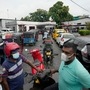 File photo: People wait in a long queues to buy fuel for their vehicles at a filling station in Colombo, Sri Lanka. (AP)