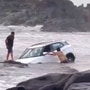 The SUV can be seen stuck in sand on the Goa beach.&nbsp;