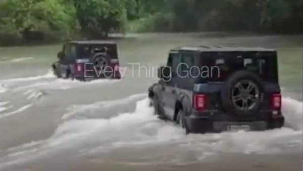 Mahindra Group Chairman Anand Mahindra shared a video of two Thar SUVs wading across a flooded Dudhsagar river in Collem, Goa. (Image credit: YouTube/Everything Goan)