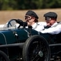 Aston Martin marked the centenary of its maiden challenge at the 1922 French Grand Prix as four-time world champion Sebastian Vettel took the original Green Pea for a spin on the track for a celebratory lap.