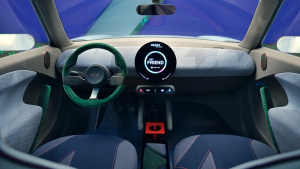 The interior of the MINI Concept Aceman is modern yet simplistic with a neat dashboard, a steering wheel, and a circular OLED touchscreen infotainment display. The infotainment system also is apparently built on Android. The interior of the MINI Concept Aceman is modern yet simplistic with a neat dashboard, a steering wheel, and a circular OLED touchscreen infotainment display. The infotainment system also is apparently built on Android.
