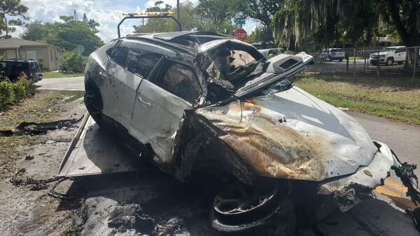 It may not look much like one but before the accident, this mangled heap was a Lamborghini Urus SUV. (Image courtesy: Fort Lauderdale Fire Rescue/Facebook)