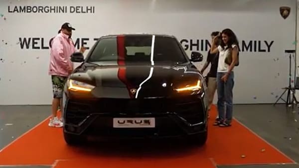 Badshah Lamborghini taking delivery of Urus at Delhi showroom.  Courtesy of Lamborghini Delhi