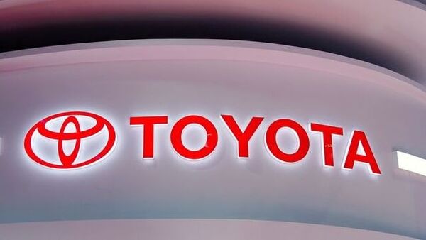 FILE PHOTO: The Toyota logo is seen at a booth during a media day for the Auto Shanghai show in Shanghai, China, April 19, 2021. REUTERS/Aly Song/File Photo (REUTERS)