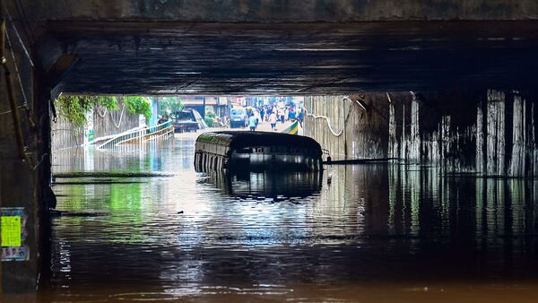 Ramnagar: A bus partially submerged at a flooded underpass on the Bengaluru-Mysuru highway following heavy monsoon downpour at Ramnagar, Karnataka.