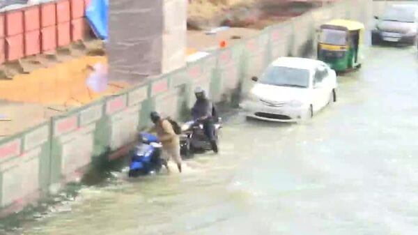 Various images posted on Twitter show that two-wheelers were floating in the water. Various images posted on Twitter show that two-wheelers were floating in the water.