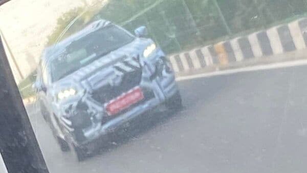 The front of the Maruti YTB looks like a smaller version of Grand Vitara.