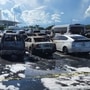 An image showing various vehicles charred by fire in the Hard Rock Stadium parking lot (@LakersCanes305/Twitter)
