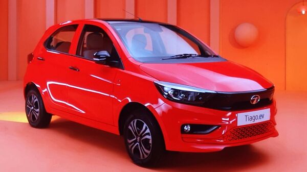 Tiago EV is seen here in a bright shade of Red, one of several colour options on the car.