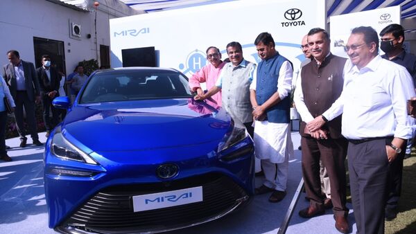 Union Minister Nitin Gadkari poses with Toyota Mirai, India's first hydrogen-powered Fuel Cell Electric Vehicle (FCEV). 
