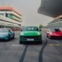 Porsche Macan (centre) along with Taycan (left) and 911 (right) have helped the luxury car manufacturer clock its best year within the first nine months of 2022.