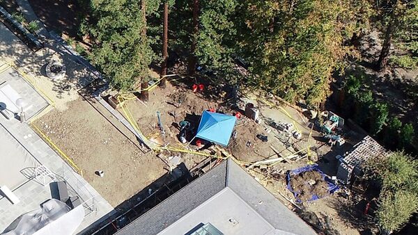 Aerial view of the site where a vehicle was found buried in the backyard of a large estate in northern California.  (AP)