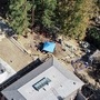 An aerial view of the site where a vehicle was discovered buried in the backyard of a sprawling property in northern California. (AP)