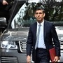 Britain's newly appointed Prime Minister Rishi Sunak arrives to deliver a speech outside 10 Downing Street in a Range Rover SUV. (AFP)