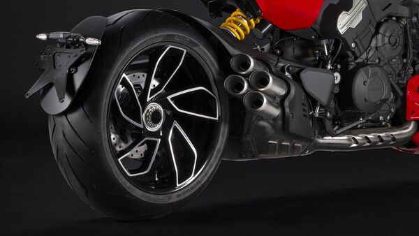 The quad exhausts are mounted on the side and there is a single-sided swingarm.. The quad exhausts are mounted on the side and there is a single-sided swingarm..
